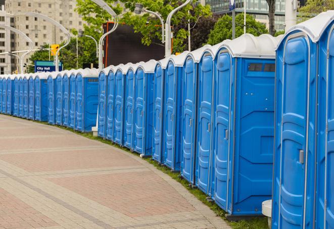 colorful portable restrooms available for rent at a local fair or carnival in East Granby, CT